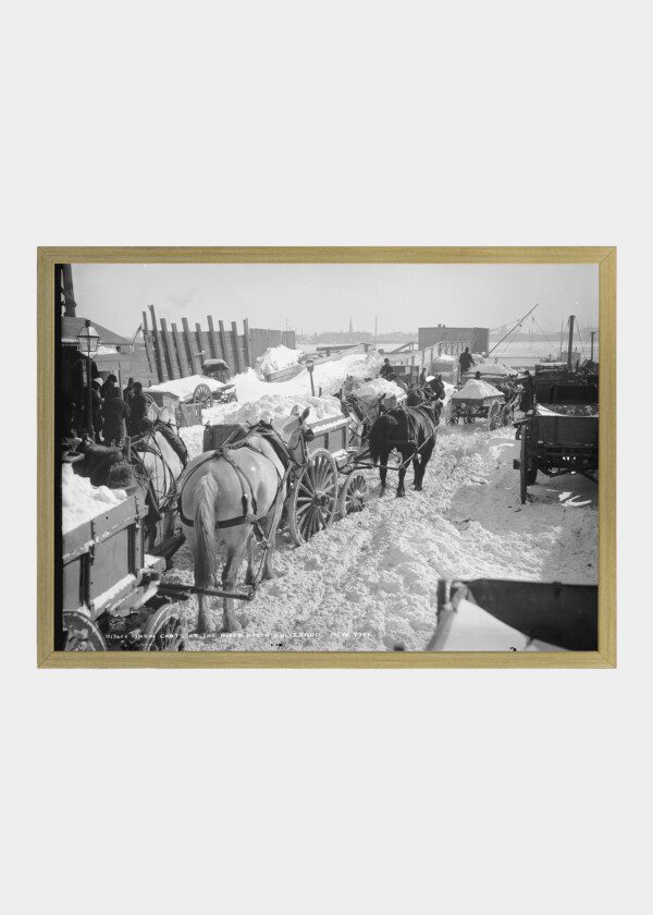 SNOW CARTS AT THE RIVER AFTER A BLIZZARD, NEW YORK 1899