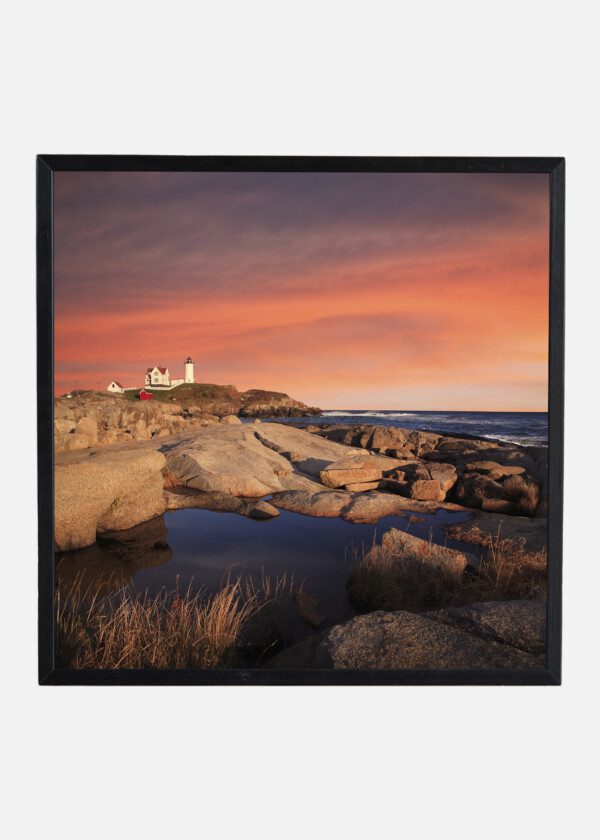 LIGHTHOUSE UNDER RED SKY
