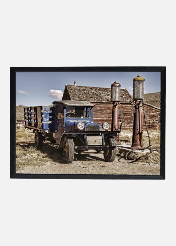 OLD TRUCK AT PETROL PUMP