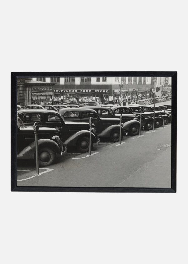 CARS PARKED DIAGONALLY ALONG PARKING METERS. OMAHA, NEBRASKA,1938
