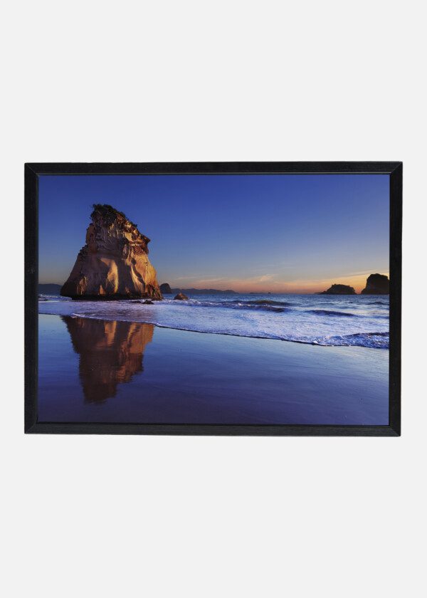 MOUNTAIN CLIFF AT THE BEACH EDGE
