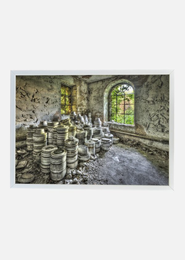 PILES OF CLAY POTS IN AN ABANDONED POTTERY FACTORY