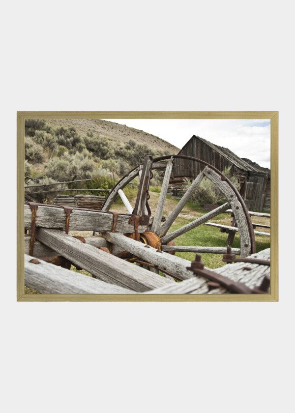 OLD WEST WAGON WHEEL IN MONTANA GHOST TOWN