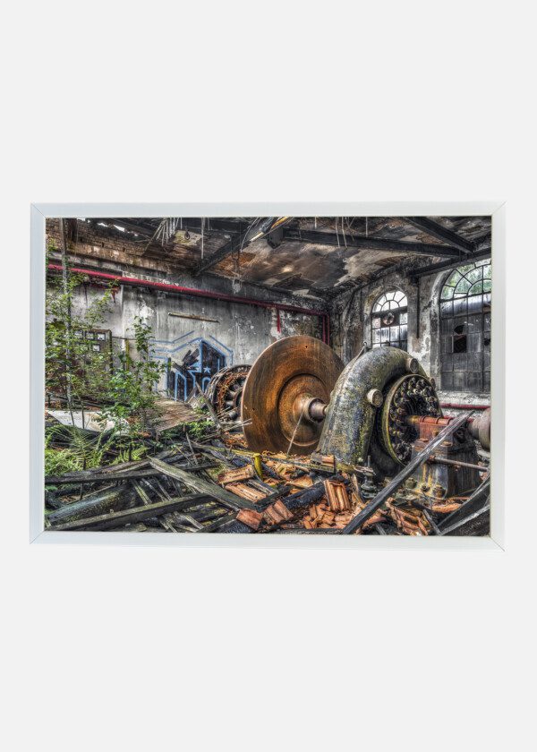 OLD TURBINE IN A RUINED FACTORY