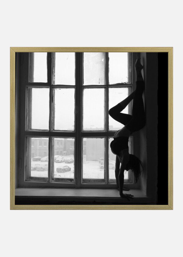 GIRL IN MOTION ON THE WINDOW