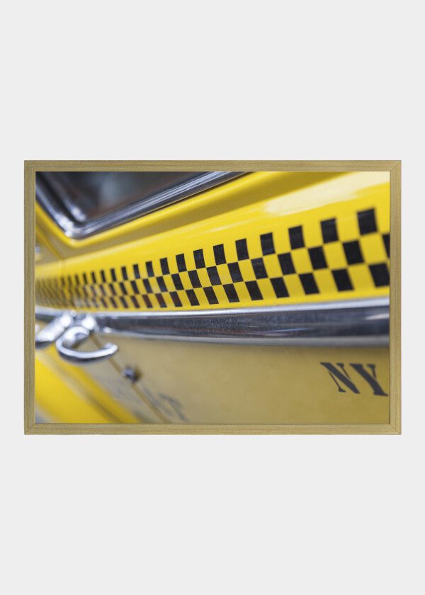 CLOSE UP OF YELLOW CAB