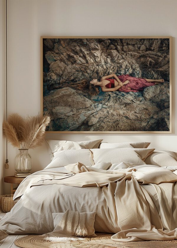 MODEL LYING ON THE ROCK