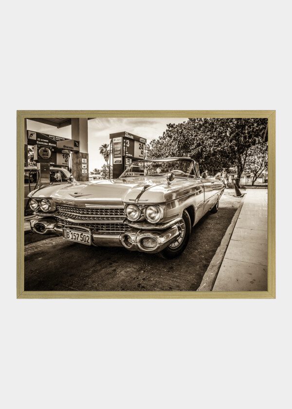 OLDER CAR AT GAS STATION