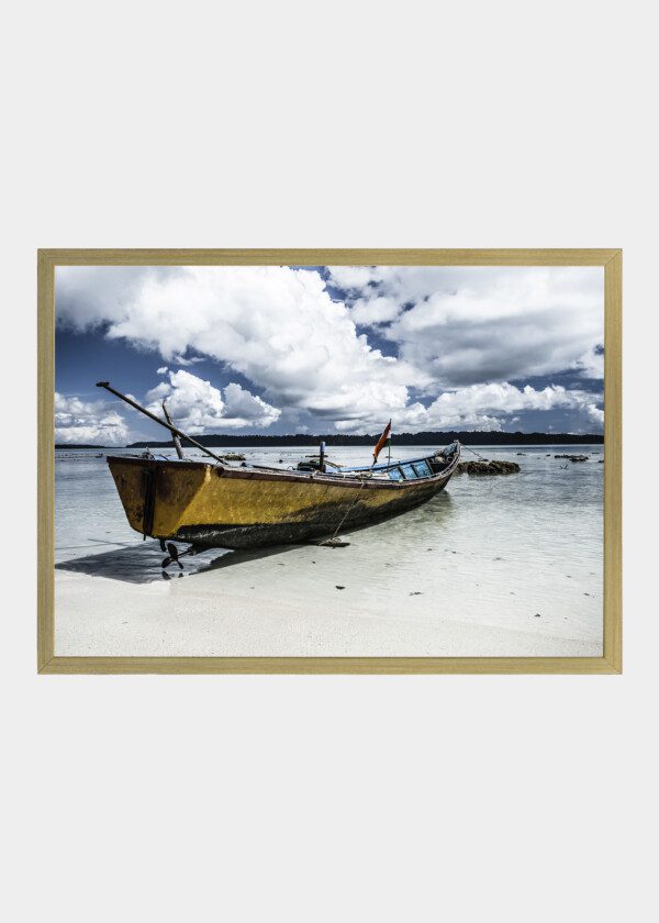 OLDER BOAT ON THE BEACH