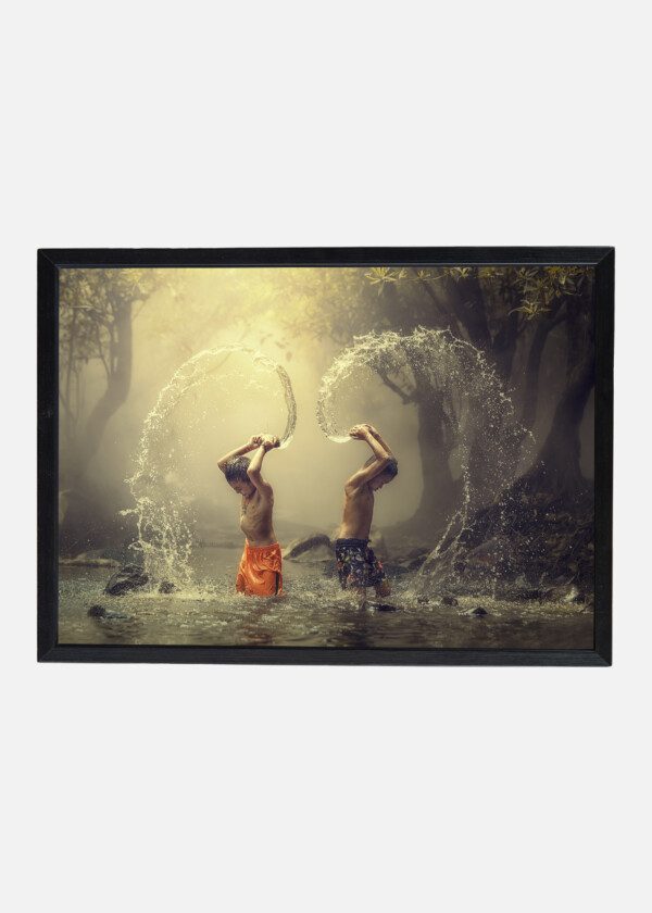 BOYS PLAYING IN THE WATER