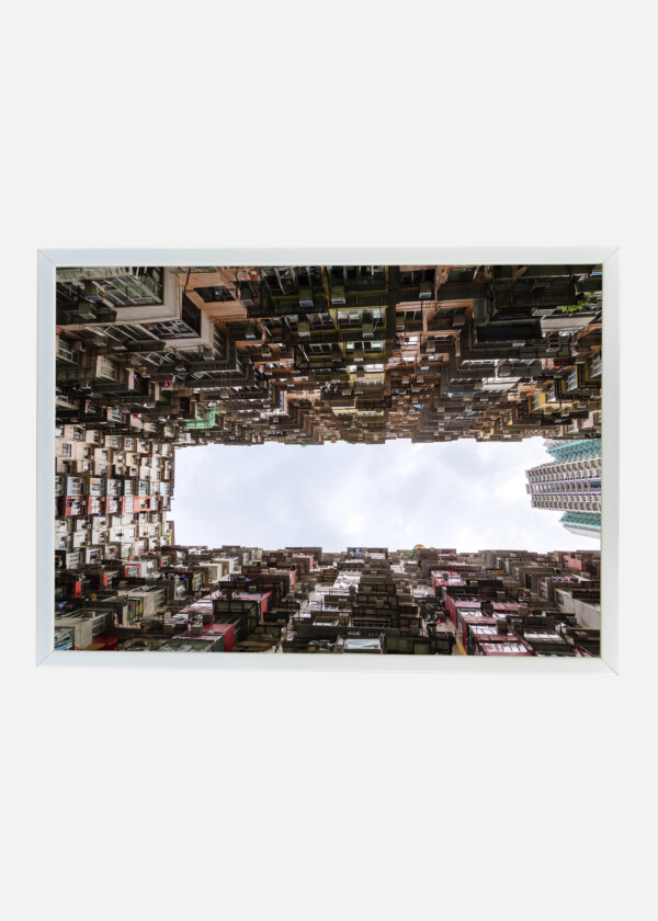 BOTTOMS UP VIEW OF OVER CROWDED HOUSING IN HONG KONG'S OLD RESIDENTIAL DISTRICT OF QUARRY BAY