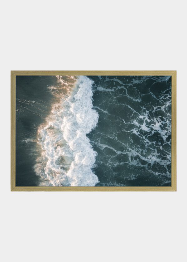AERIAL VIEW OF A BREAKING WAVE IN THE ATLANTIC OCEAN