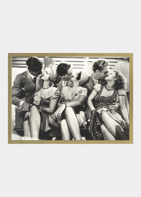 THREE COUPLES KISSING