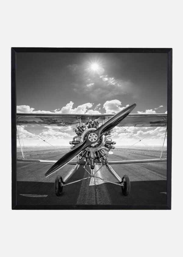 VINTAGE AIRPLANE ON A RUNWAY