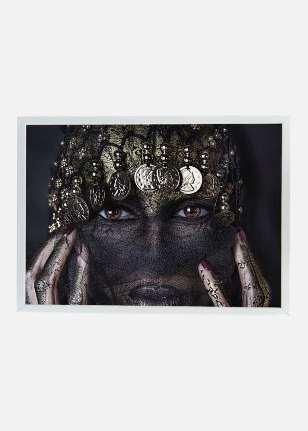 WOMAN IN VEIL AND COINS
