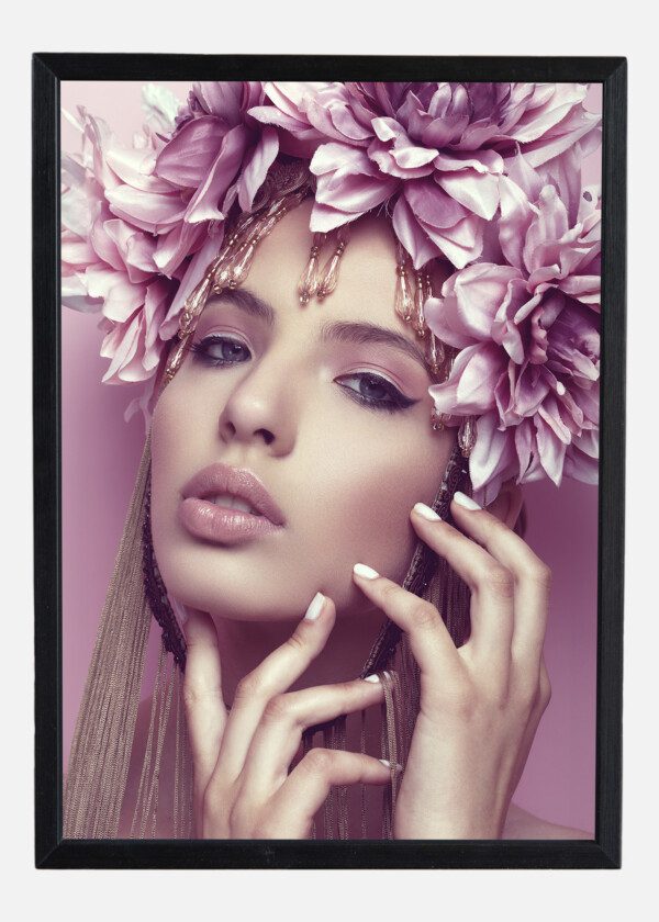 BEAUTIFUL WOMAN WITH FLOWER CROWN AND MAKEUP ON PINK BACKGROUND