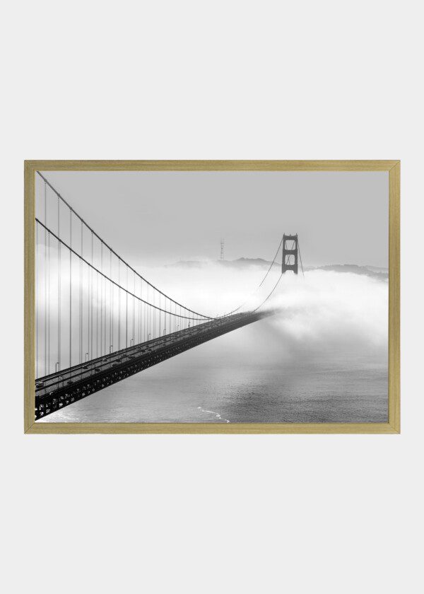 MORNING FOG PASSING UNDER THE GOLDEN GATE BRIDGE