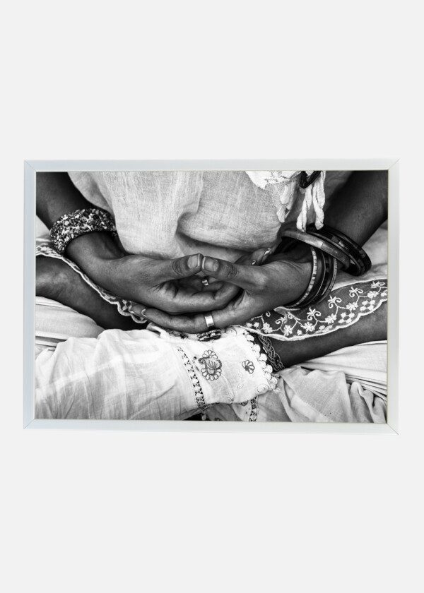 WOMAN HANDS IN YOGA MUDRA GESTURE CLOSEUP OUTDOOR BLACK AND WHITE