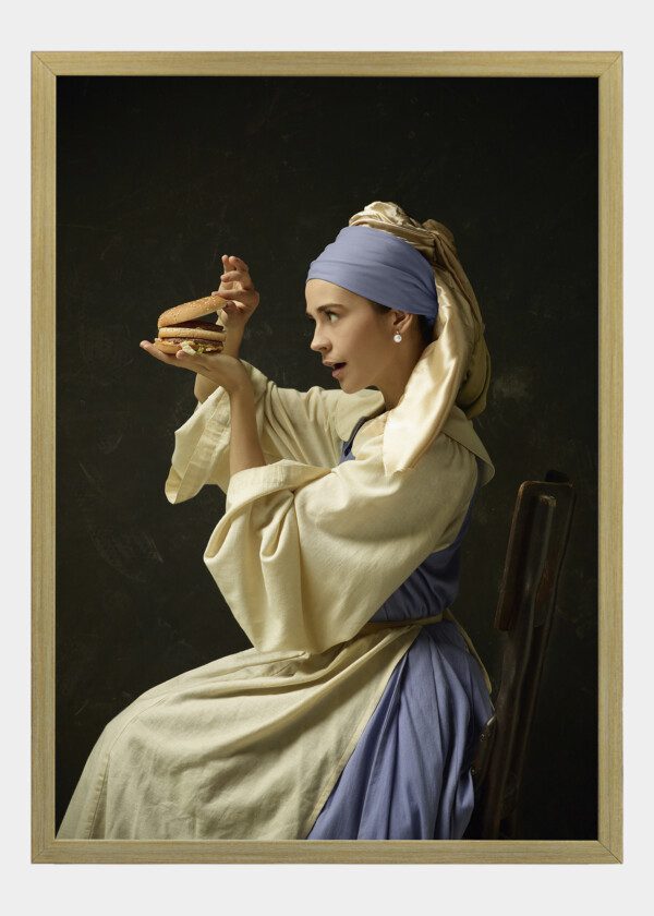 MEDIEVAL WOMAN IN HISTORICAL COSTUME WEARING CORSET DRESS AND BONNET WITH BURGER
