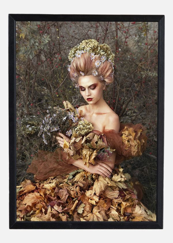 CLOSE UP PORTRAIT OF YOUNG BEAUTIFUL GIRL WITH FLOWER PROFESSIONAL MAKEUP