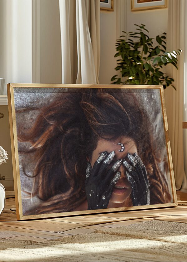 CLOSE UP OF BEAUTIFUL YOUNG WOMAN COVER EYES WITH HANDS PAINTED BLACK