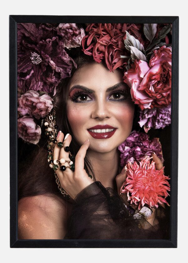 CLOSE UP PORTRAIT OF YOUNG BEAUTIFUL GIRL WITH FLOWER PROFESSIONAL MAKEUP